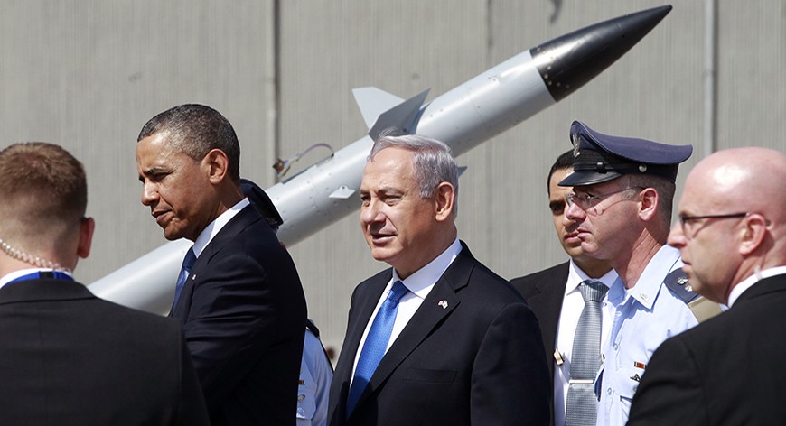 U.S. President Barack Obama and Israeli Prime Minister Benjamin Netanyahu (C) view an Iron Dome missile defense battery at Ben Gurion International Airport in Tel Aviv March 20, 2013. Obama said at the start of his first official visit to Israel on Wednesday that the U.S. commitment to the security of the Jewish state was rock solid and that peace must come to the Holy Land. REUTERS/Jason Reed (ISRAEL - Tags: POLITICS MILITARY) - RTR3F821