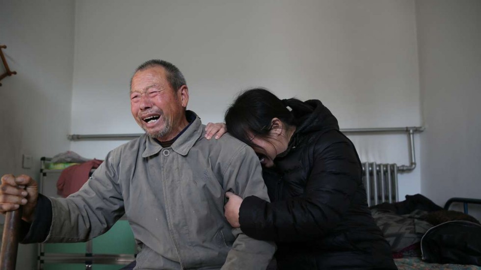 The father and sister of Nie Shubin, who was executed in 1995 for rape and murder, react after the Supreme People's Court ruling.