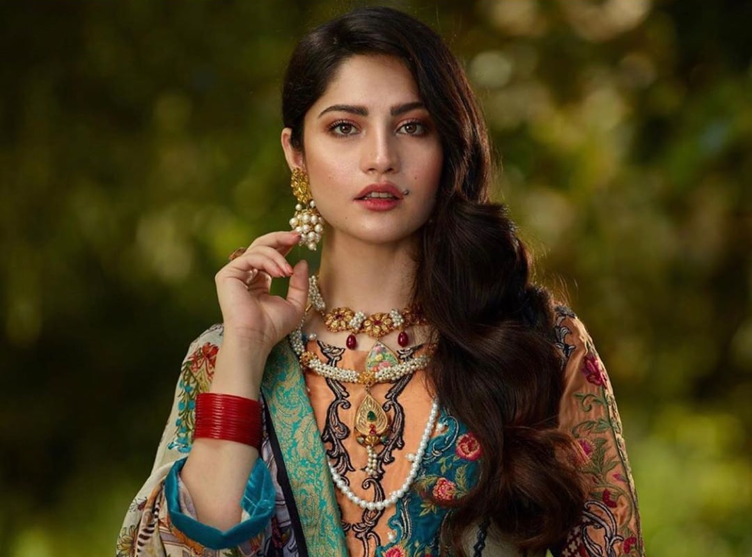 Neelam Muneer stuns fans in form-fitting parrot green dress