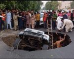 Massive Sinkhole In Lahore Swallows Three Vehicles Causes Major Traffic Disruptions