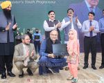 Ahsan Iqbal Kneels In Respect To Present Award To Sania Abbas Celebrating Her Inspiring Journey