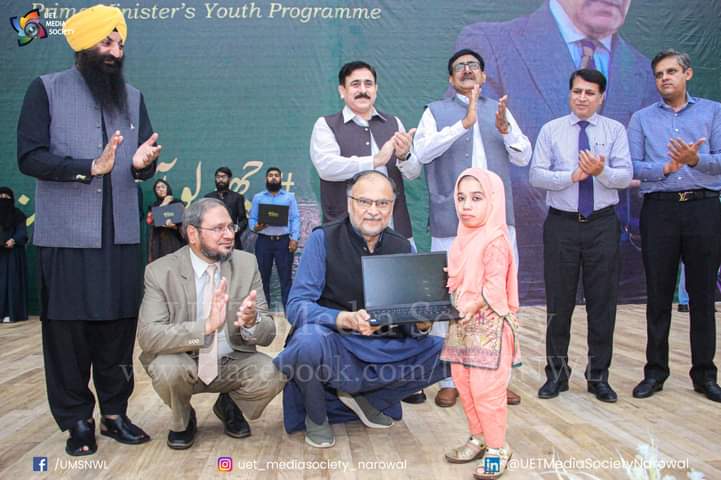 Ahsan Iqbal Kneels In Respect To Present Award To Sania Abbas Celebrating Her Inspiring Journey