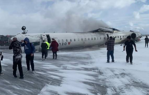 Delta Airline Crash At Snow Covered Toronto Airport Leaves Several Passengers Injured Video