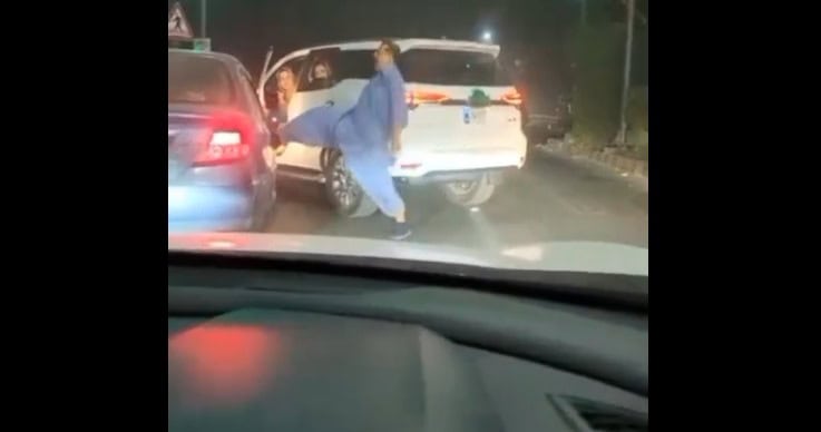 Power Ka Nasha Alleged Govt Officer Spotted Abusing Kicking Car In Viral Road Rage Video