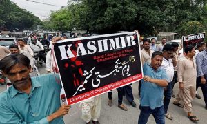 Demonstrators Hold Signs And Chant Slogans As They March In Solidarity With The People Of Kashmir, During A Rally In Karachi