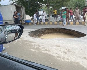 Sinkhole Appears On Lahores Model Town Link Road After First Monsoon Rain 
