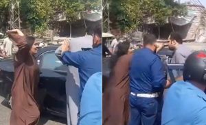Lahore Woman Caught On Camera Assaulting Driver After Minor Accident Video