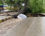 Car Plunges Into Sinkhole In Lahores Samanabad After Heavy Rain