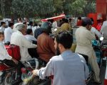 Minister Distributes Free Fuel To Motorcyclists Displaying Pakistani Flags On Independence Day
