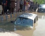 Car Sinks Into Ground Near Karachis Tariq Road Woman Rescued
