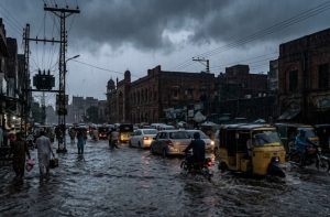 Lahore Reels Under Heavy Rain Faces Waterlogging Power Outages