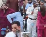 Watch Karachi Woman Blocks Traffic Damages Vehicles After Car Rickshaw Collision
